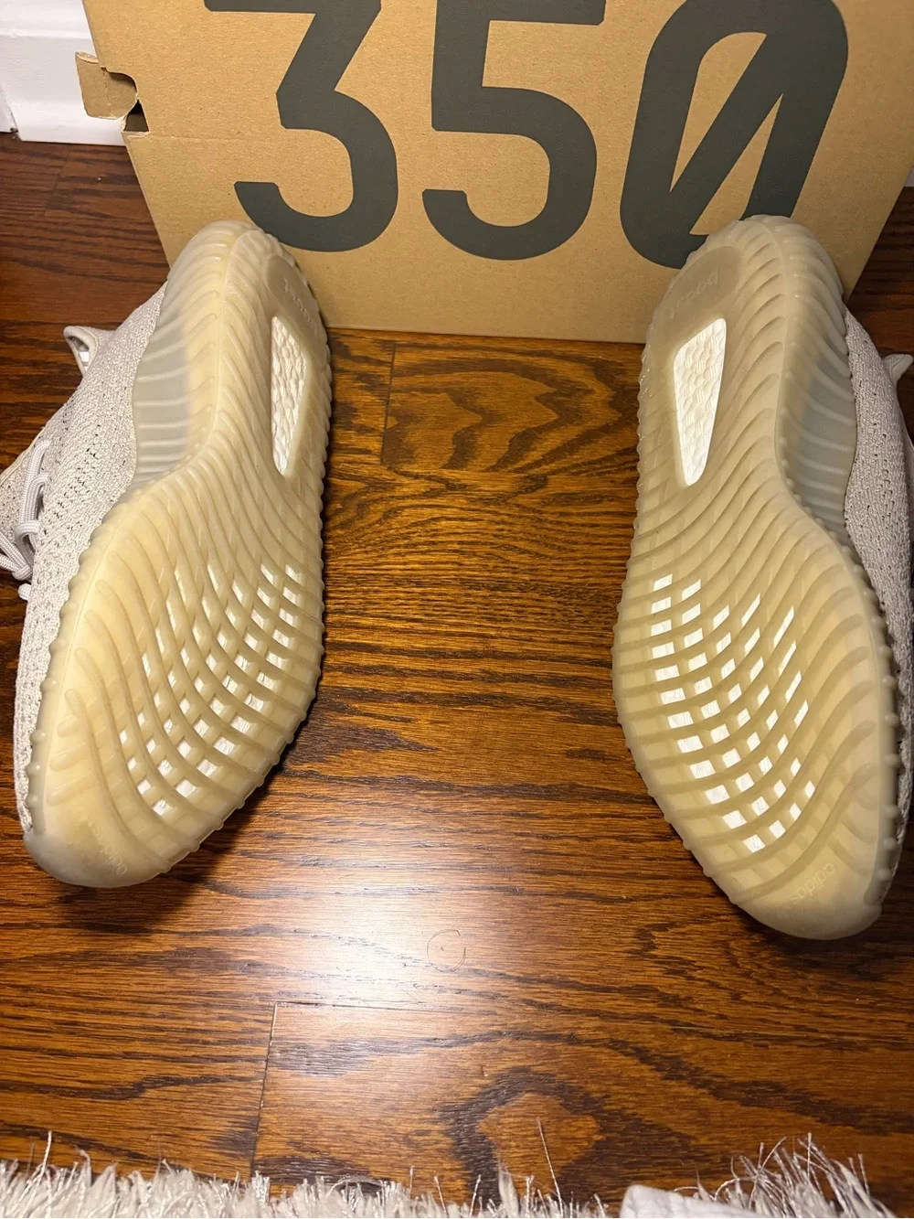 Yeezy Cream and Black Stripe Sneakers